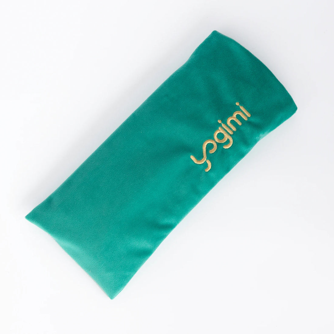 Meditar con Zafú y almohadilla modelo Tropic Green Yogimi Patry Montero.