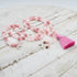 Japa mala de meditación de cuarzo rosa y ágata rosa con borla de seda rosa y detalle de medalla de flor de loto en plata de ley de Yogimi.